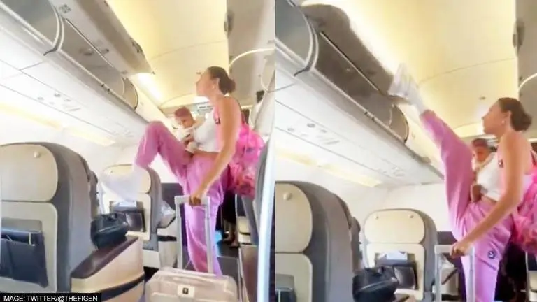 Woman with baby in arm closes flight's overhead bin with foot; sparks divided reactions Woman