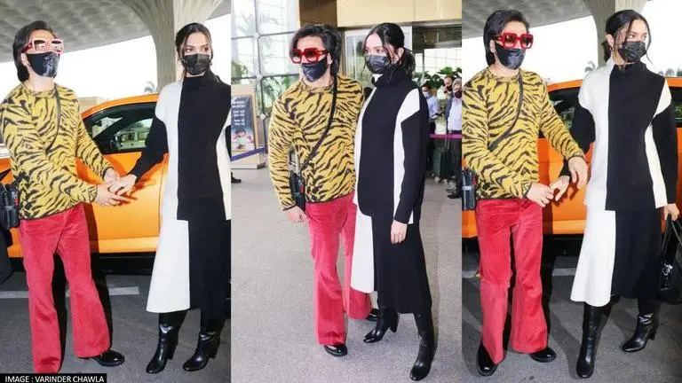 Ranveer Singh gives Deepika peck on her cheek at airport but his red pants steals the show ranveer Singh