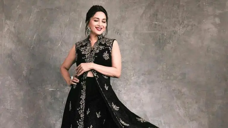 Madhuri Dixit Nene gets lost in thoughts while relaxing in garden; calls it 'Camouflage' Madhuri Dixit Nene