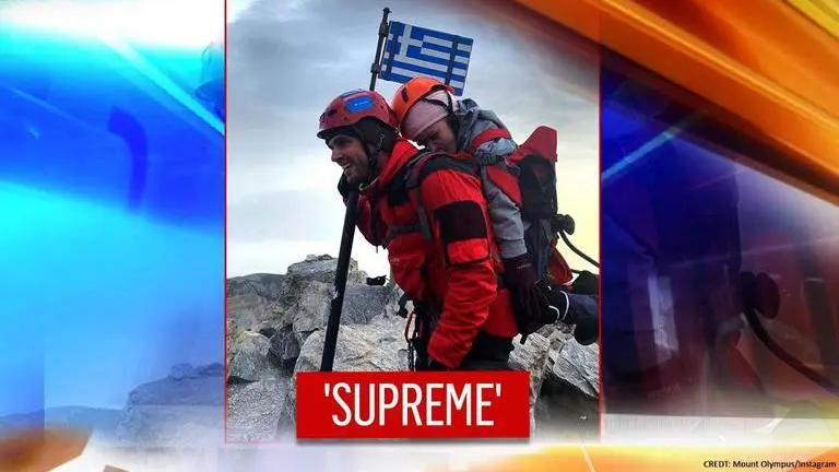 Athlete fulfils his differently-abled student's dream, carries her up to Mount Olympus Athlete