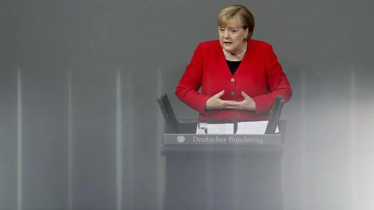 Merkel says virus spike is a threat to work achieved