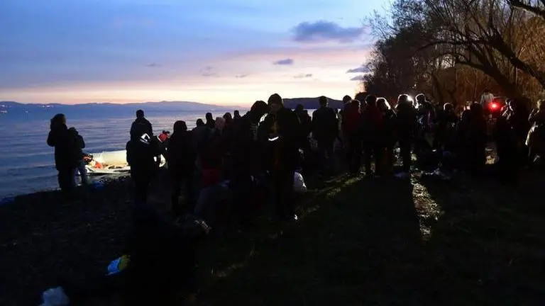 UN says 13,000 migrants mass at Turkey's border with Greece UN says 13,000 migrants mass at Turkey's border with Greece