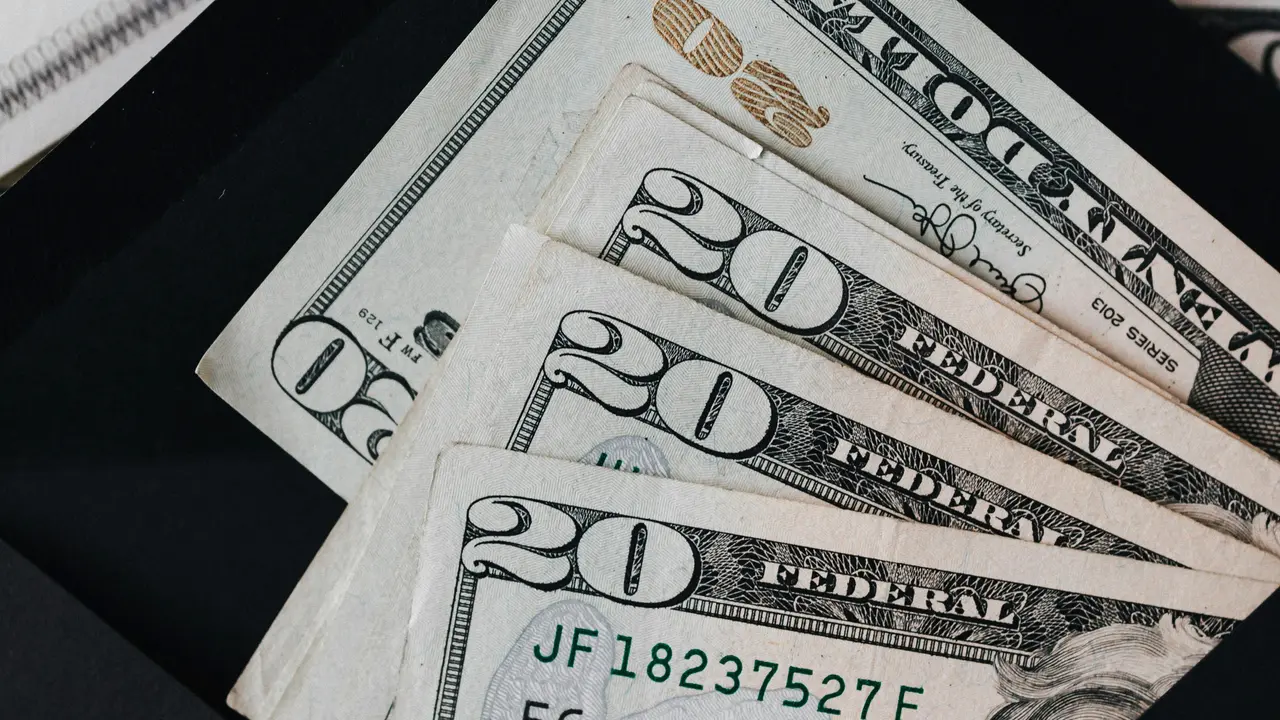 Emerging market currencies feel pressure due to a strong dollar and concerns over sustained US interest rates.