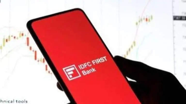 IDFC First Bank slips, IDFC surges to new heights after merger approval IDFC First Bank
