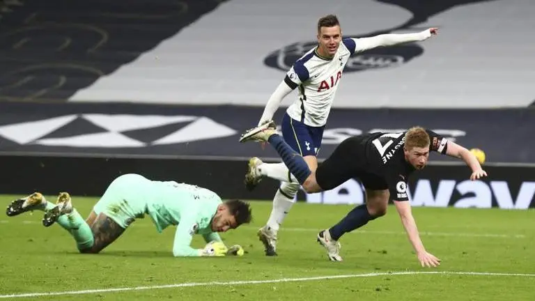 Tottenham beats Man City 2-0 to go top of Premier League