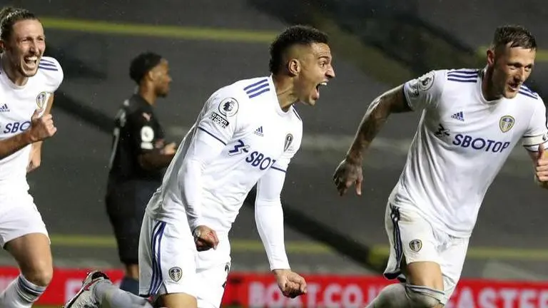 Man City slips further behind leader Everton with Leeds draw