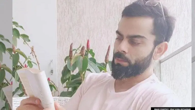 Virat Kohli gives fans glimpse of enjoying Mumbai monsoons for the first time with a book Virat Kohli