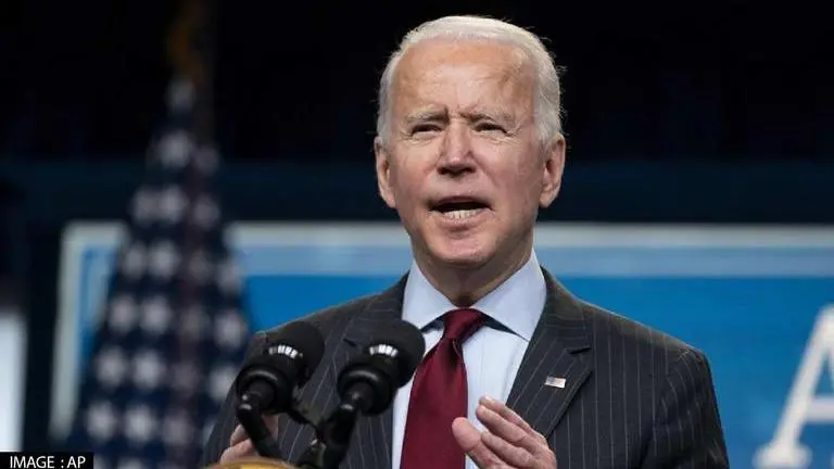 Biden says predecessor Trump's pullout from Paris Accord put US behind schedule Biden