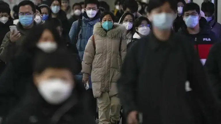 Virus death toll in China's capital shows further rise