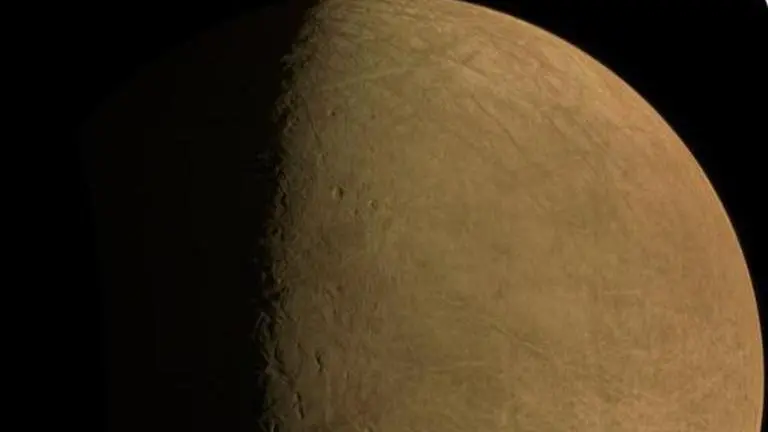 NASA's Juno beams 1st picture from Europa flyby; closest by a spacecraft in over 22 years NASA