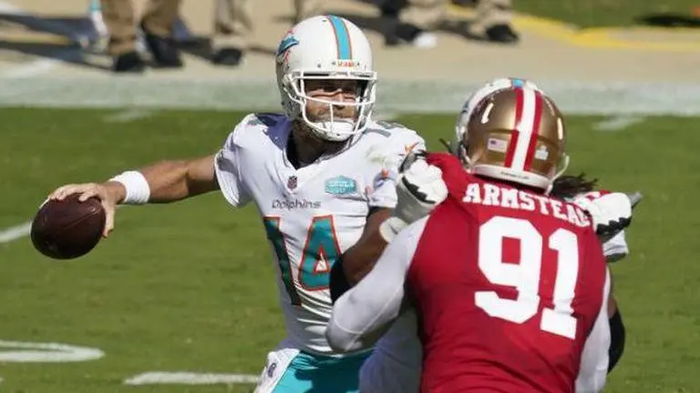 Tua gets off the bench, but only for Dolphins celebration