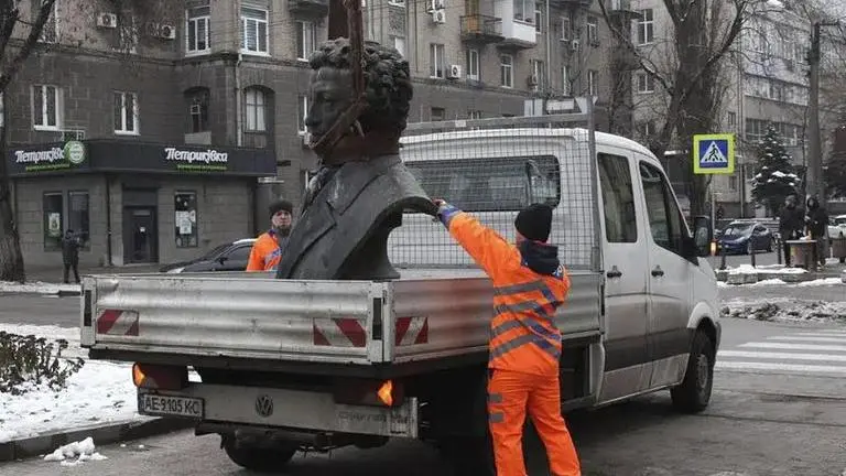 Wartime Ukraine erasing Russian past from public spaces Municipal workers dismantle a monument of Russian writer Alexander Pushkin