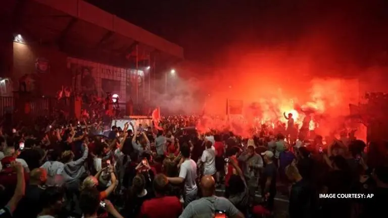 Liverpool fans defy lockdown rules, social distancing to celebrate title win at Anfield Liverpool fans