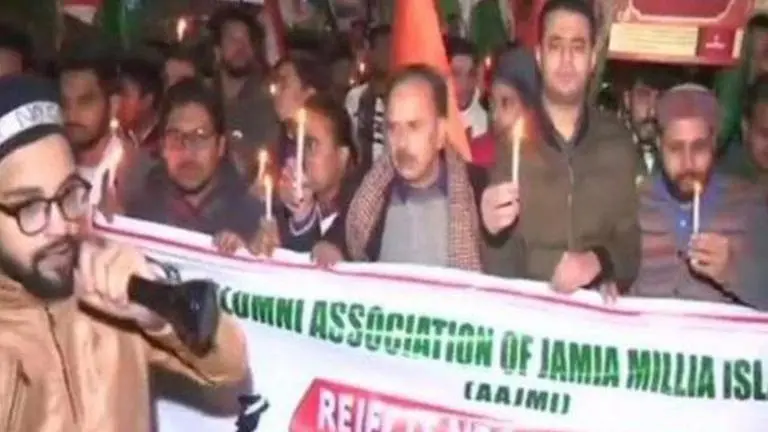 Delhi: Jamia's Alumni Association participates in candlelight march against CAA, NRC, NPR Delhi