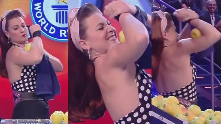 Woman creates world record by crushing most apples with biceps in a minute apples