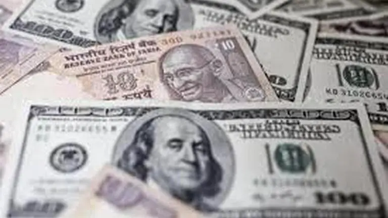Rupee recoups day's losses, settles 12 paise higher against USD Rupee