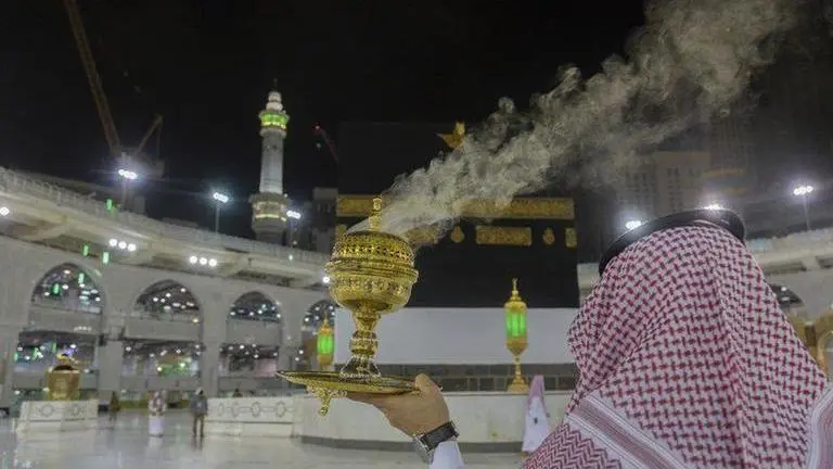 Pilgrims return to Mecca as Saudi eases virus restrictions