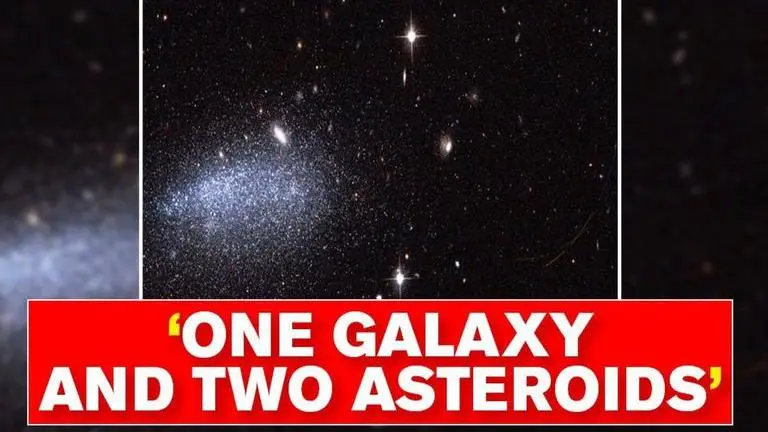 NASA’s Hubble Space Telescope captures 'one galaxy and two asteroids' NASA