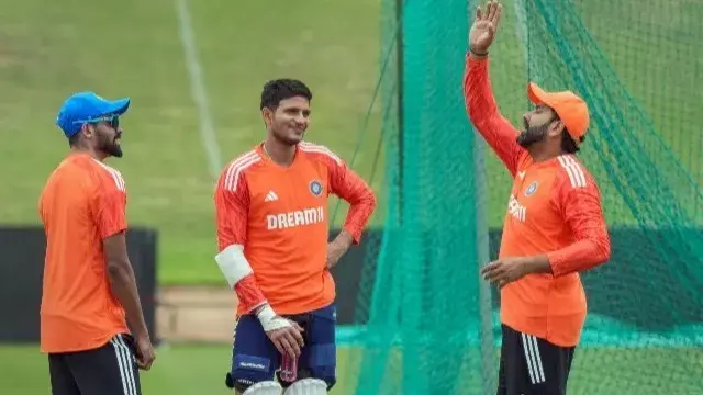 Rohit Sharma is seen sharing a light moment with Mohammed Siraj and Shubman Gill during a practice session