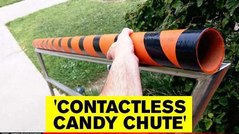'Totally awesome': US man designs touchless trick-or-treating candy chute for Halloween US