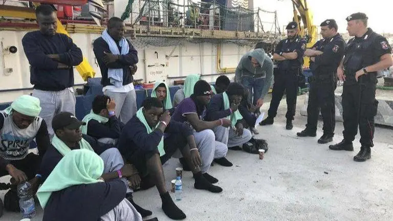 Libya migrants allowed to disembark in Italy after rescue boat saves 424 people Libya