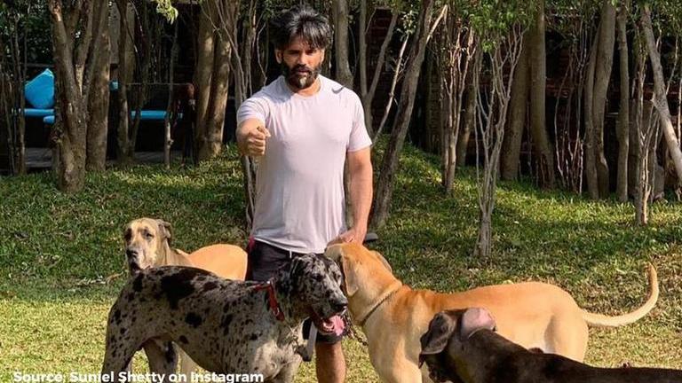 Suniel Shetty and his pet Brody pose for picture amid lush greenery ...