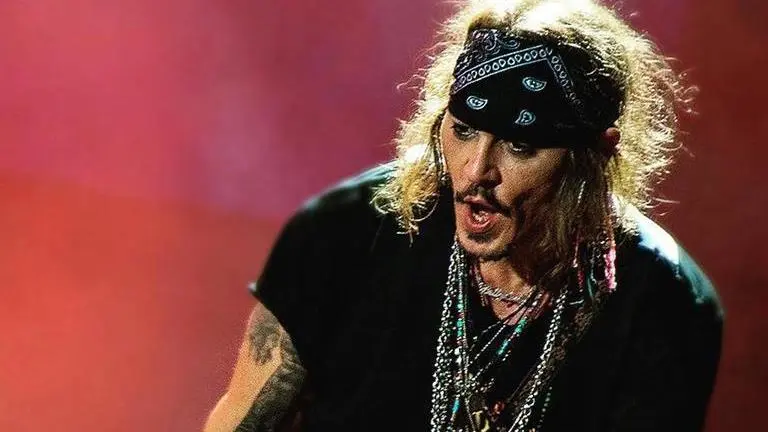 Johnny Depp postpones Hollywood Vampires concert after suffering ankle injury Johnny Depp