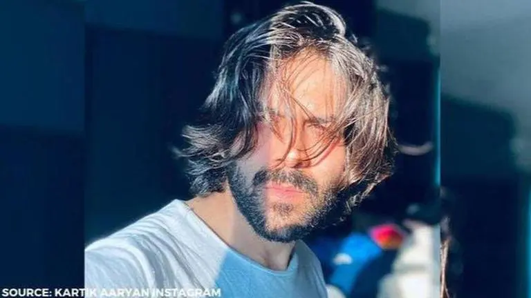 Kartik Aaryan flaunts his new hairstyle; fans quip 'ghane baalon ka raaz' kartik aaryan