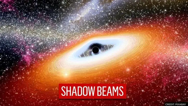 NASA's Hubble Telescope captures black hole's 'shadow beams' spilling out NASA