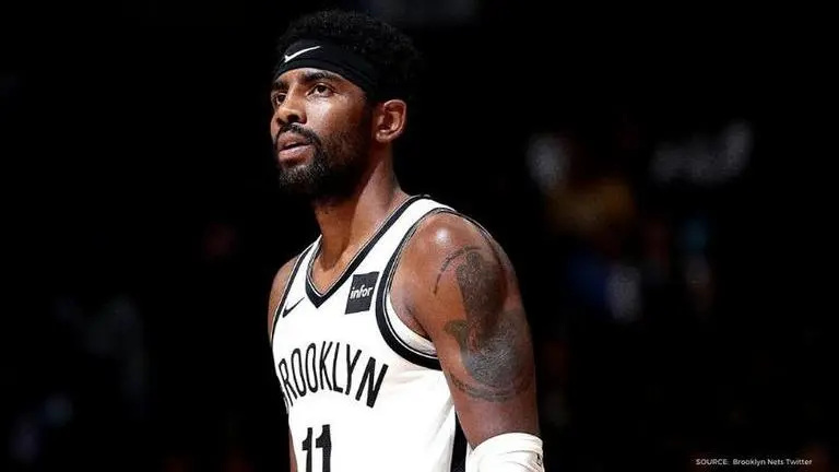 Kyrie Irving signs BURNT jersey for Brooklyn Nets fan after his house catches fire Kyrie Irving