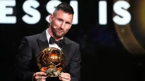 'King of the King': Netizens react to Lionel Messi winning Ballon d'Or for record 8th time Lionel Messi poses with Ballon d'Or award
