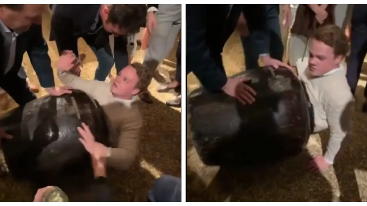 Viral Video: Man Gets Stuck in Vase at New Year's Eve Party, Hilarity Ensues Man Gets Stuck in Vase at New Year's Eve Party