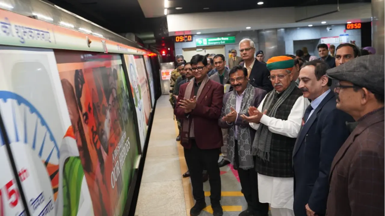 Specially wrapped train being flagged off from Mandir House Station