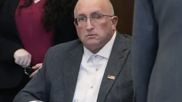 Father of July 4th parade shooting suspect pleads guilty to misdemeanors for son's gun license US