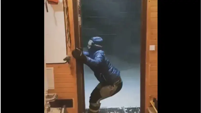 Viral Video: Man struggles to close a door on a windy day in Antarctica | WATCH A man seen braving intense wind conditions in Antarctica