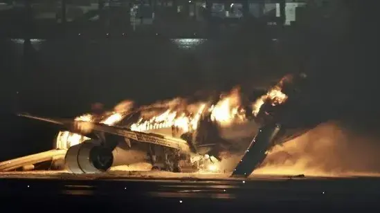 ALERT | Tokyo's Haneda airport crash sparks cancellation of over 100 flights Haneda airport suspends flights after massive fire