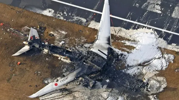 Japanese safety experts search for voice data amid workers clearing plane debris from runway tokyo