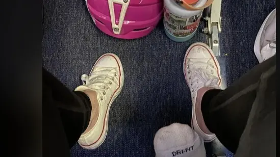 Flyer's 'Disturbing' Pic Showing Socked Foot Poking Underneath Seat Sparks Debate Flyer's 'Disturbing' Pic Sparks Debate