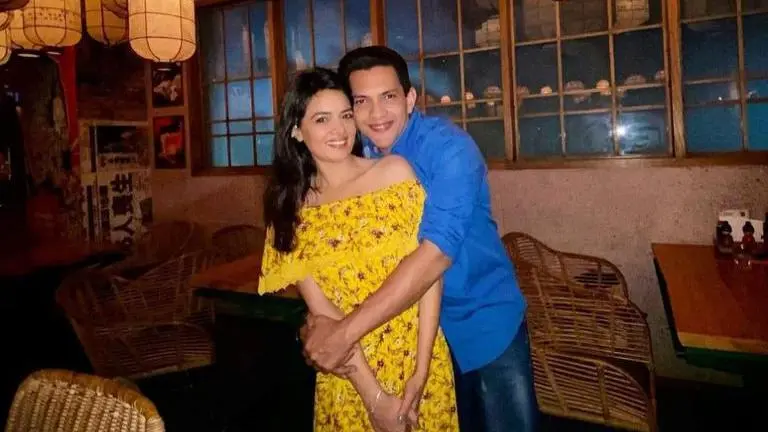 Aditya Narayan pulls his wife Shweta Agarwal's leg as she lends a hand making dessert Aditya Narayan