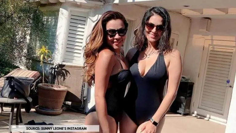 Sunny Leone goes swimming with her friend in a black bikini; see post Sunny Leone