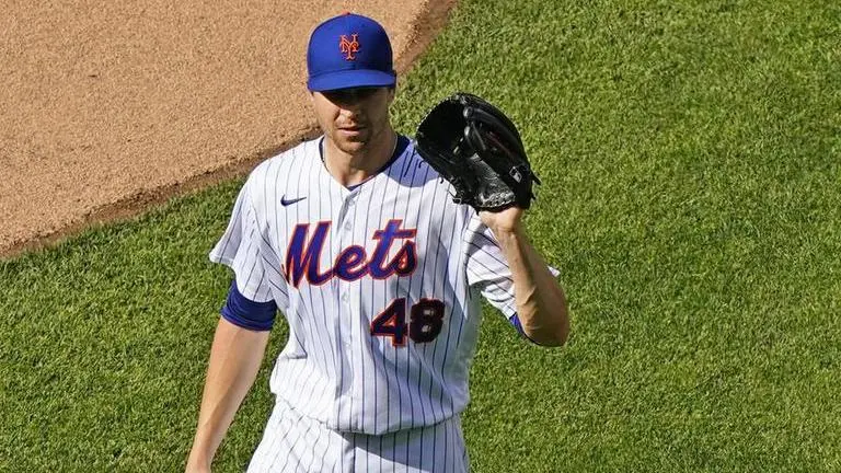 DeGrom dominates after shoulder scare, Mets beat Braves 4-2 DeGrom dominates after shoulder scare, Mets beat Braves 4-2
