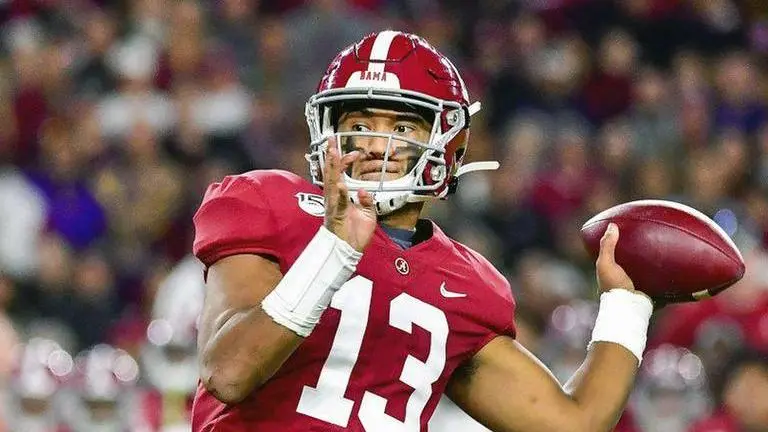 Dolphins' Tagovailoa is a playful, willing backup -- for now