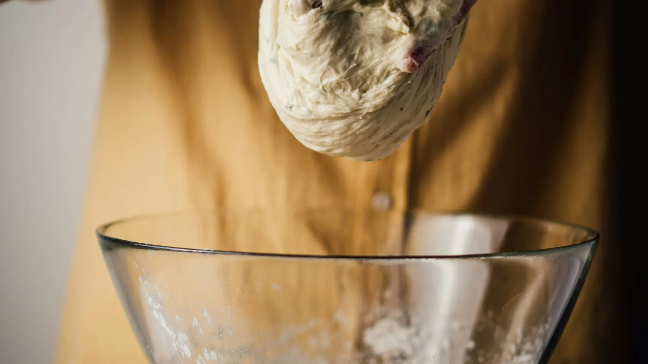 Sourdough bread, made from flour, water, and salt fermented using lactic acid bacteria and wild yeast, is considered the healthiest substitute for regular bread. 