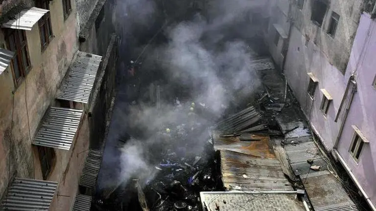 Delhi Fire: Anxious relatives wait to hear a response from those working in the factory Delhi