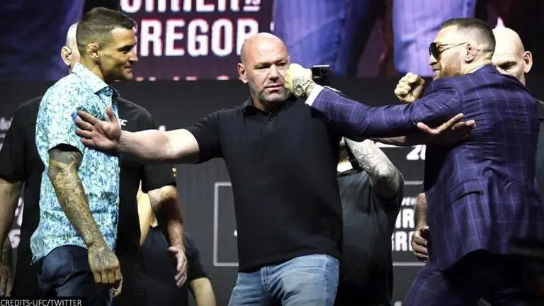 Conor McGregor attempts to kick Dustin Poirier at UFC 264 press conference Conor McGregor