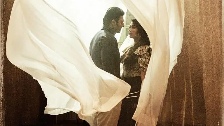 'Radhe Shyam': Prabhas-Pooja lost in each other's eyes in new poster ahead of song release Radhe Shyam, prabhas, pooja hegde