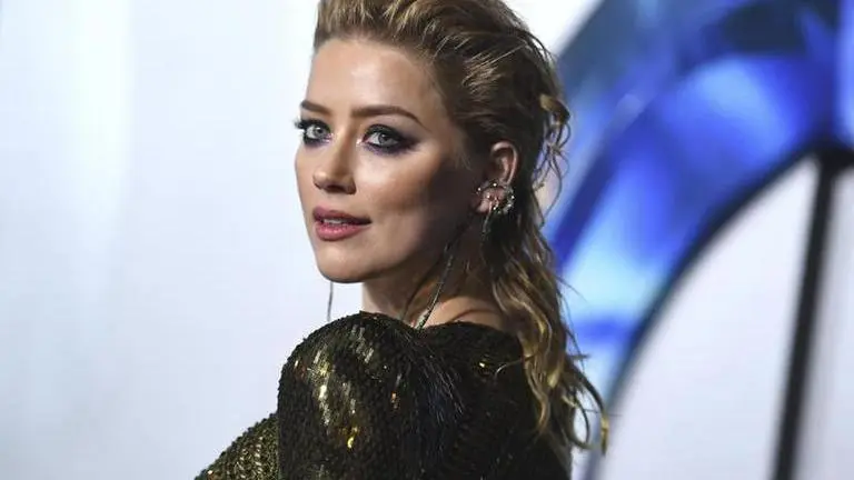 Amber Heard is mom 'on her own terms' to baby girl Oonagh actor