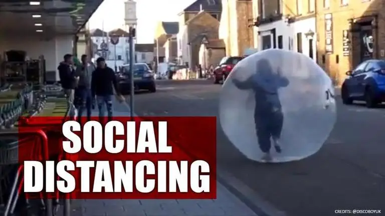 UK woman heads out for shopping in a zorb ball amid COVID-19 scare; watch Woman takes social distancing to next level