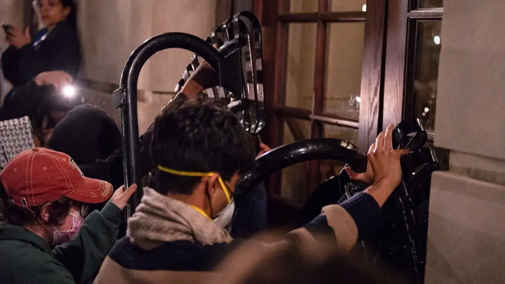 Columbia University Threatens to Expel Students Occupying Hamilton Hall Students blocked the entrance of Hamilton Hall using furniture and metal barricades.