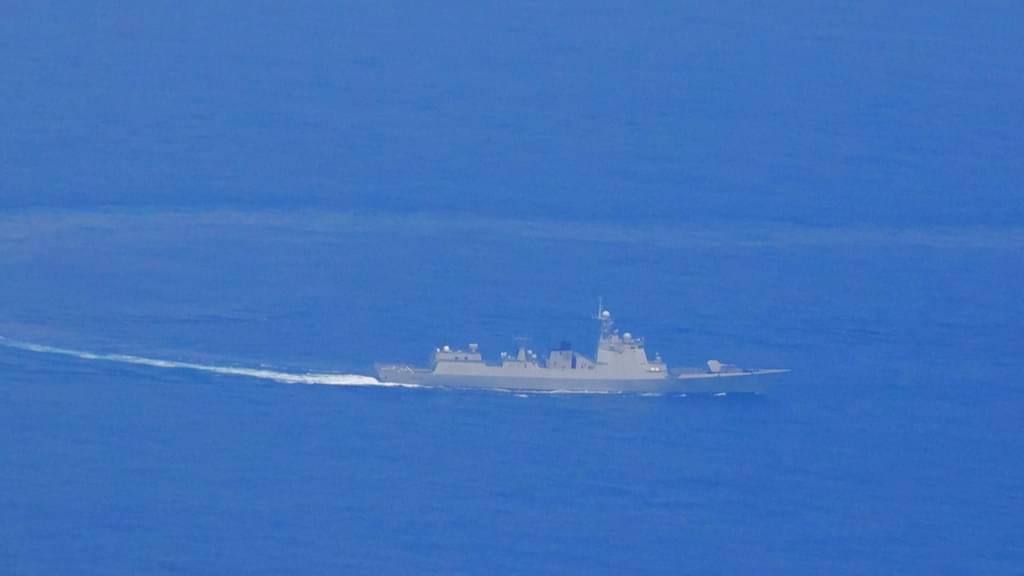 A photo released by the Taiwanese Defence Ministry shows a Chinese guided missile destroyer near the coast of the island nation. 